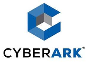 The image displays the CyberArk logo. It features a hexagonal geometric design in shades of blue and gray above the text CYBERARK in bold black and blue letters.